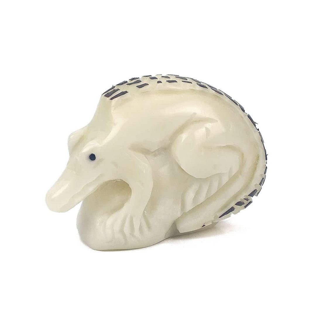 a hand carved tagua nut crocodile 