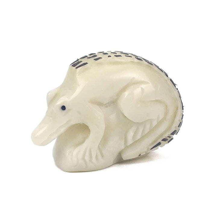 a hand carved tagua nut crocodile 