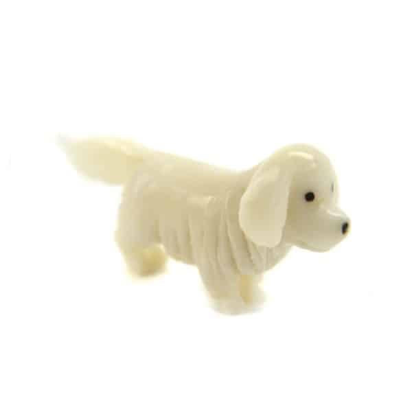 a hand carved tagua nut dog retriever 