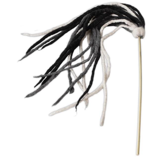 Black and white feathered cat toy on a stick against a white background