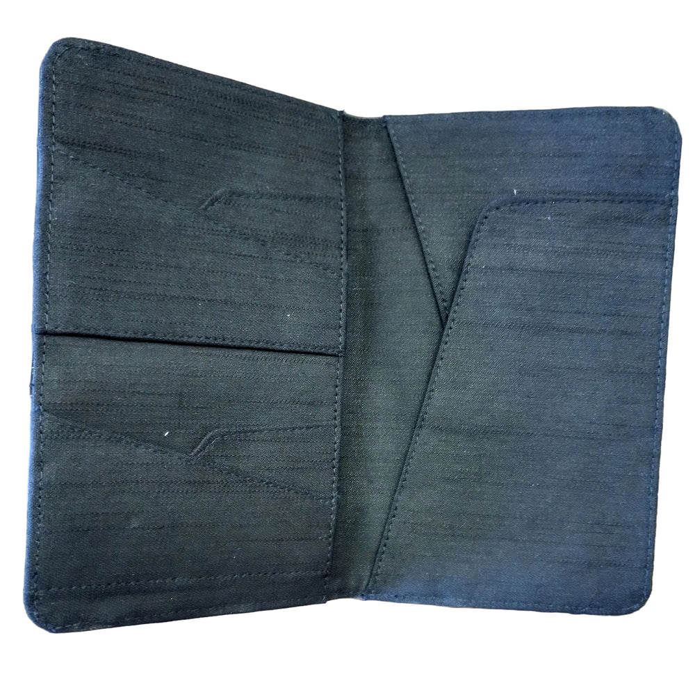 Black fabric passport holder on a white background