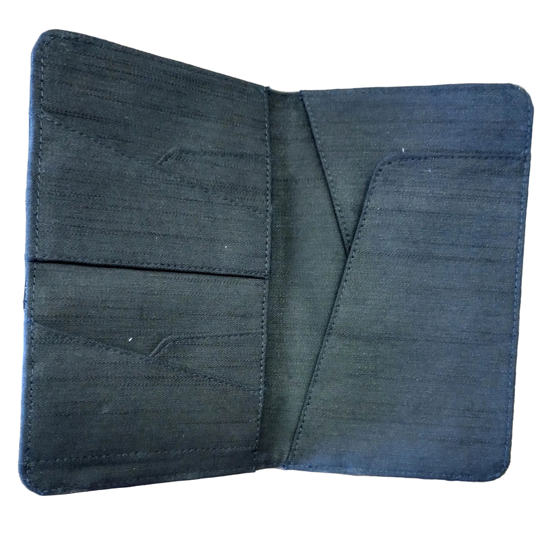 Black fabric passport holder on a white background