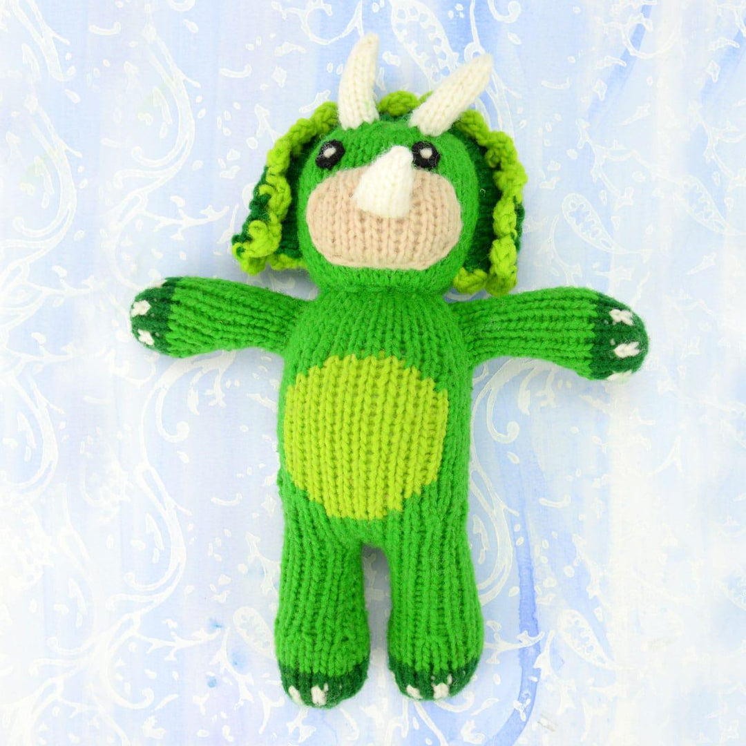 A handmade wool doll depicting stegosaurus