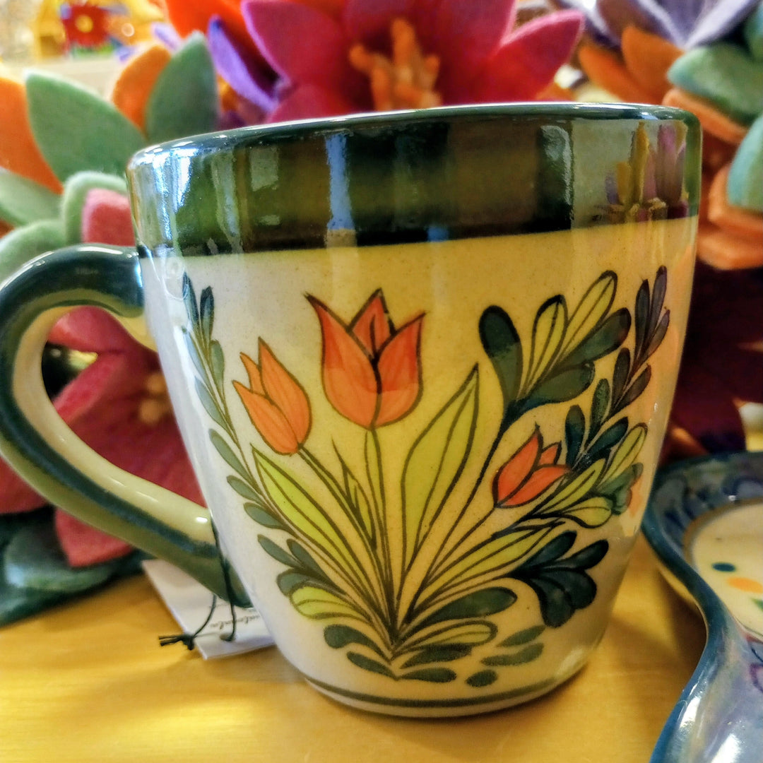 Decorative mug with tulip design with a colorful background