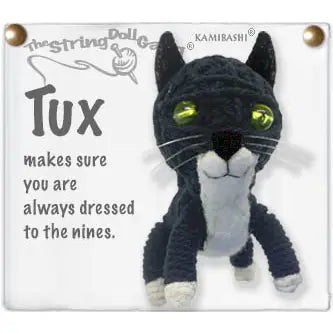 A string cat doll named Tux, made from a knitted string doll template by Kamibashi, shown on a white square card with text that reads 'Tux makes sure you are always dressed to the nines.'.