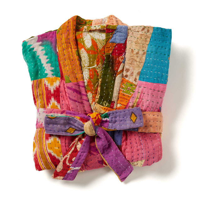 Colorful upcycled sari patchwork robe with a tie at the center on a white background