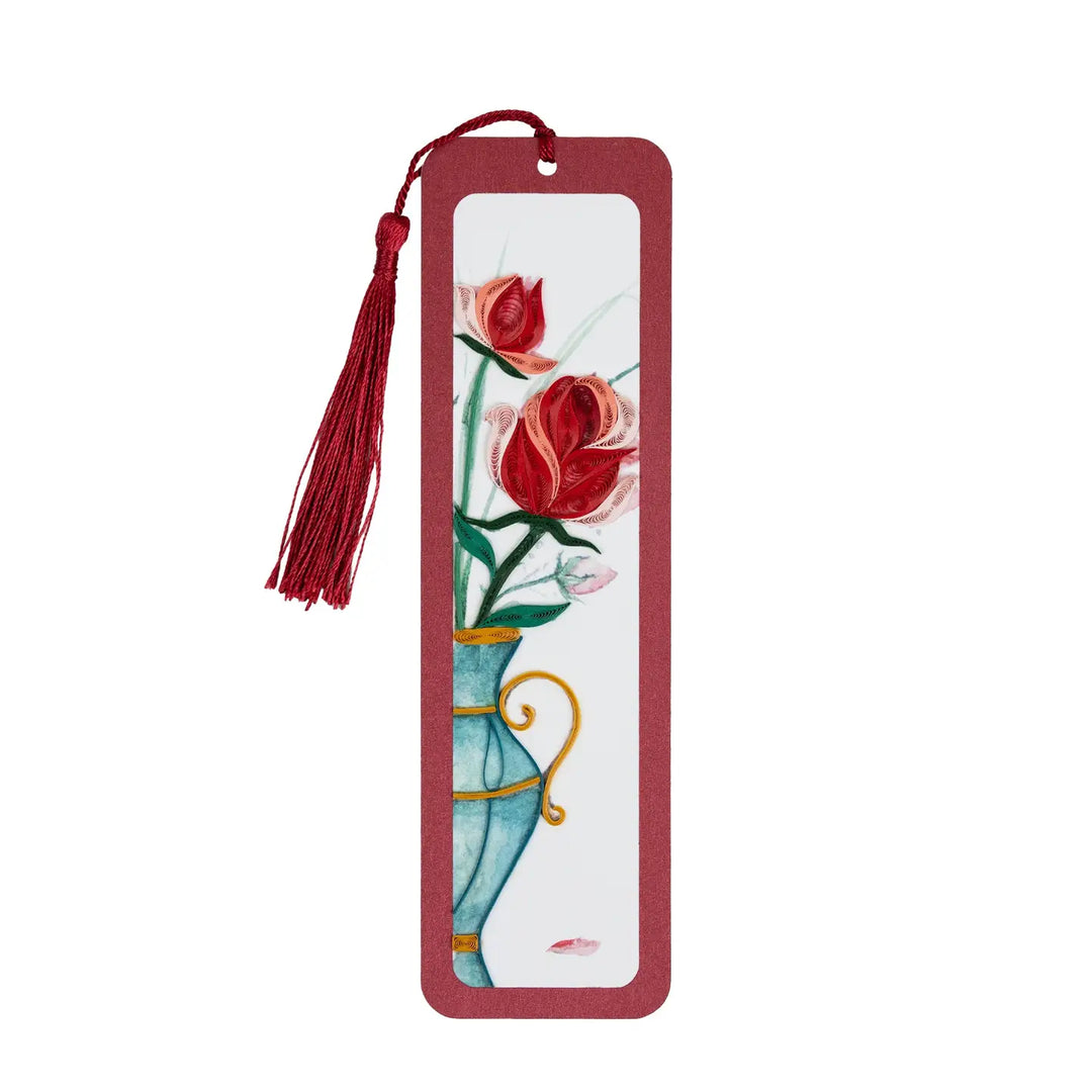 Bookmark with red roses and a tassel on a white background