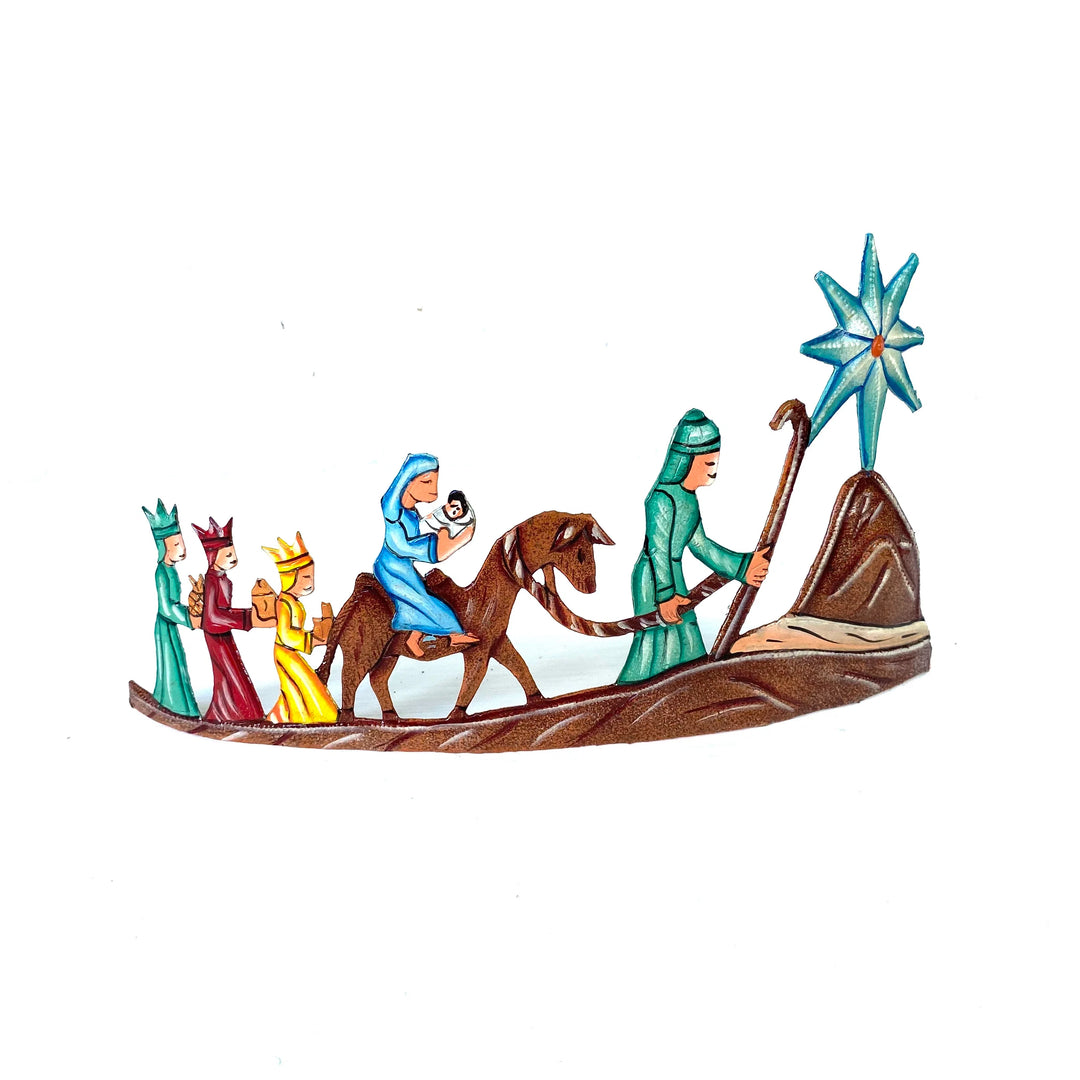 a metal nativity scene of the nativity walking with a white background