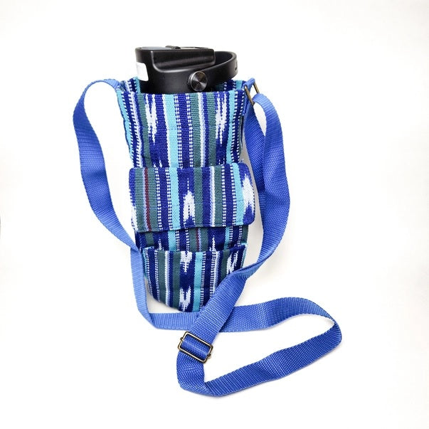 Blue and green striped water bottle bag with water bottle on a white background