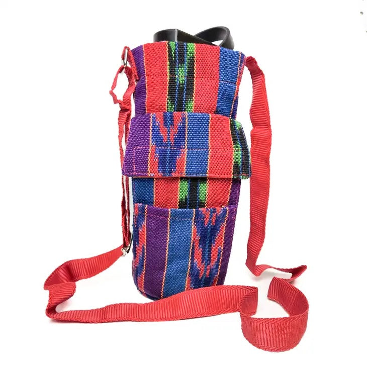 Colorful striped pouch with a red strap on a white background