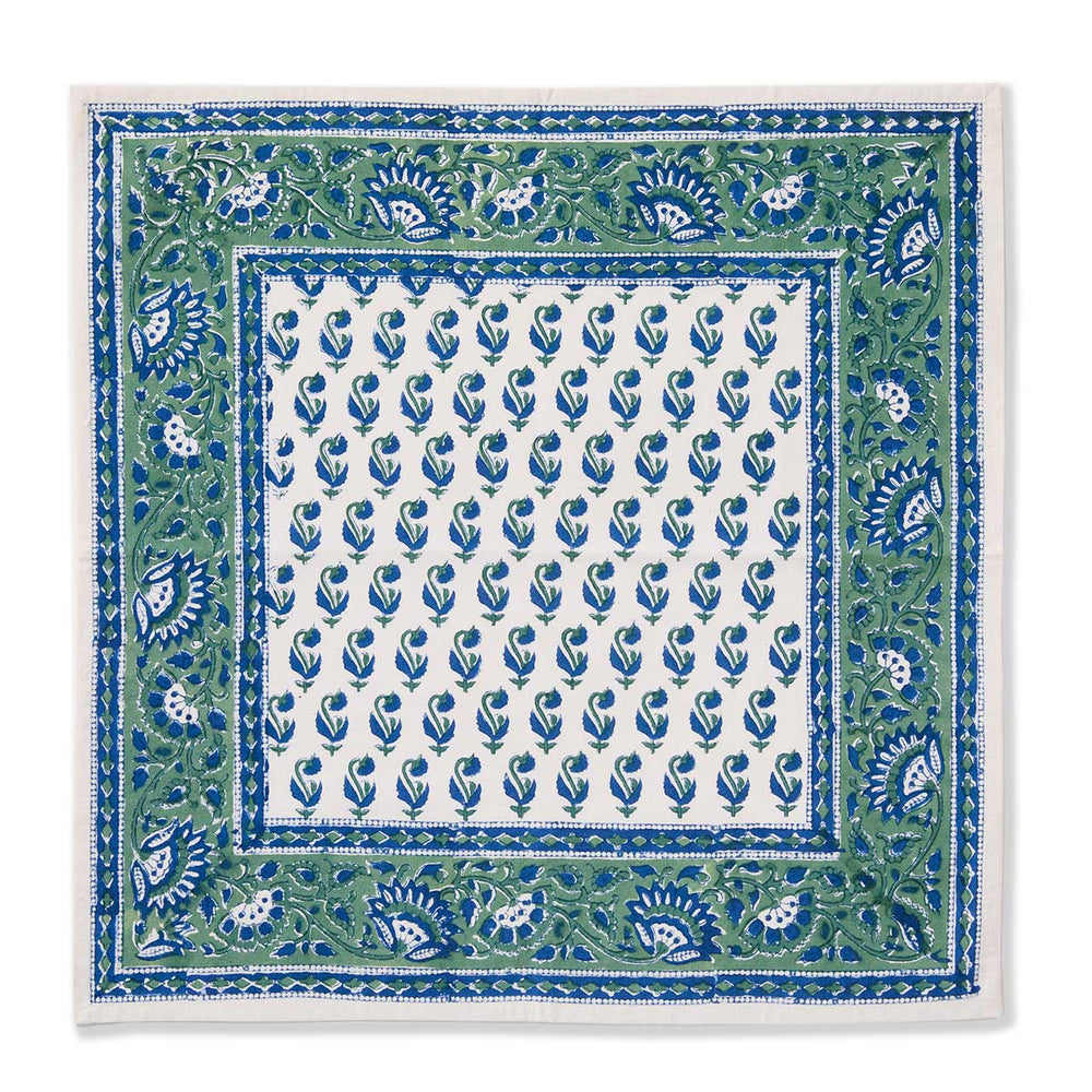 Square fabric with blue and green floral pattern on a white background