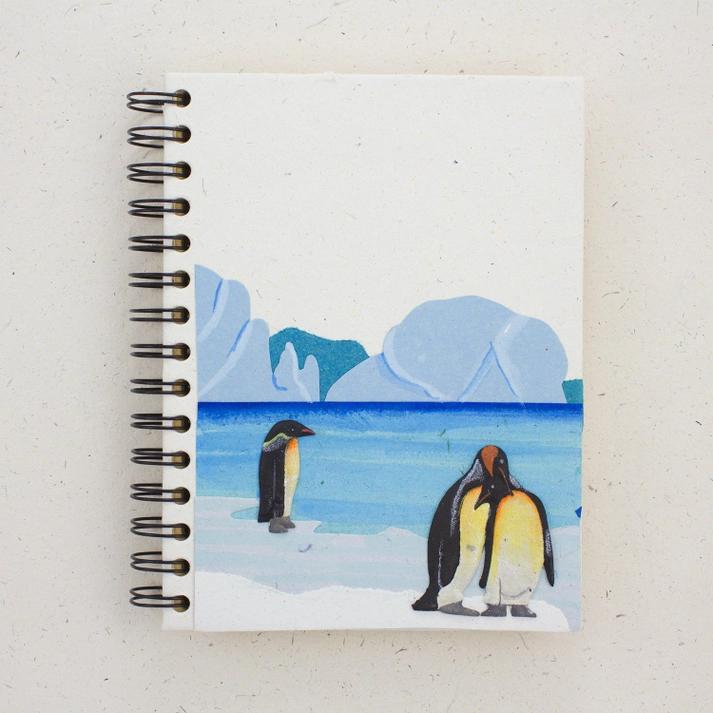 Mr. Ellie Pooh notebook with penguin illustration on a white background