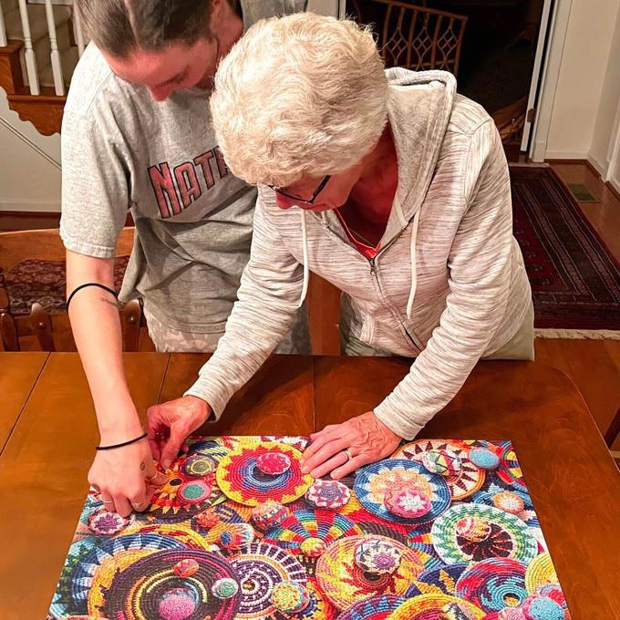 A women completing a puzzle 