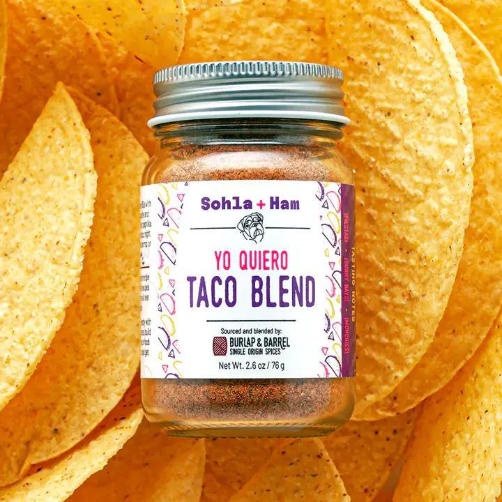 Jar of Sohma + Ham Yo Quiero Taco Blend on a background of tortilla chips