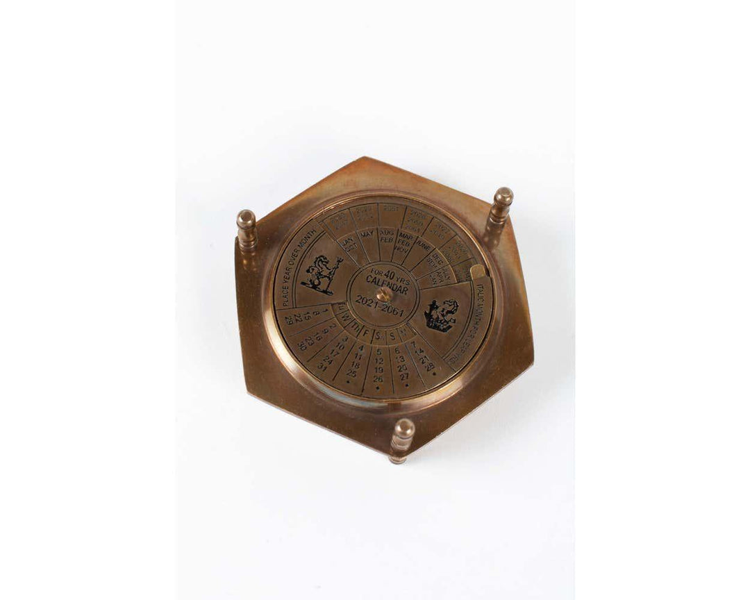 40 Year brass calendar by Ten Thousand Villages 