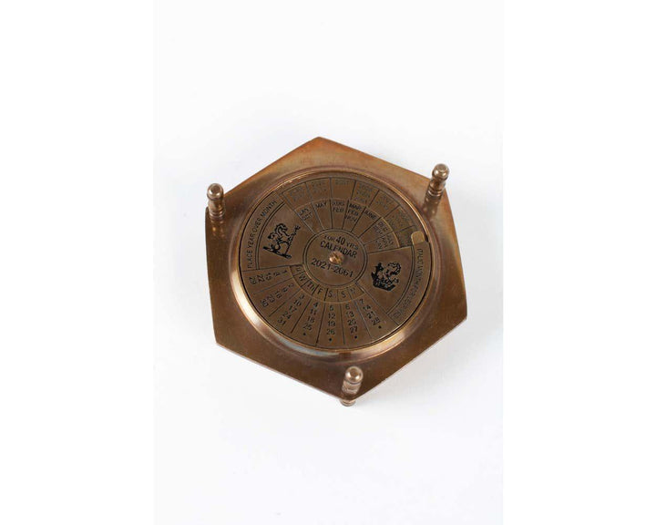 40 Year brass calendar by Ten Thousand Villages 