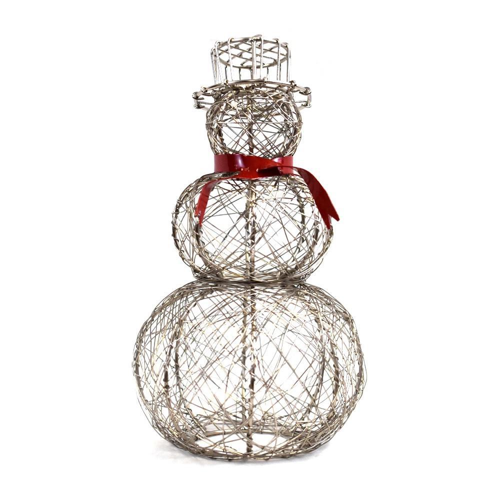 A wire snowman with a red scarf standing against a white background.