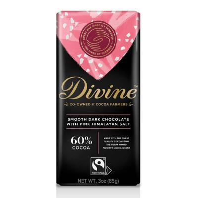 A bar of dark chocolate with pink Himalayan salt, branded by Divine, with 60% cocoa content.