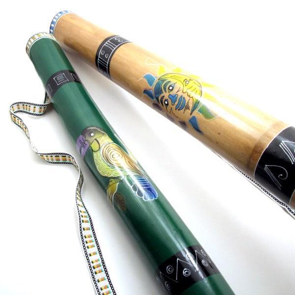 A collection of two rainsticks with straps, each with a different color and decorated with different bird and insect designs, standing upright against a white background.