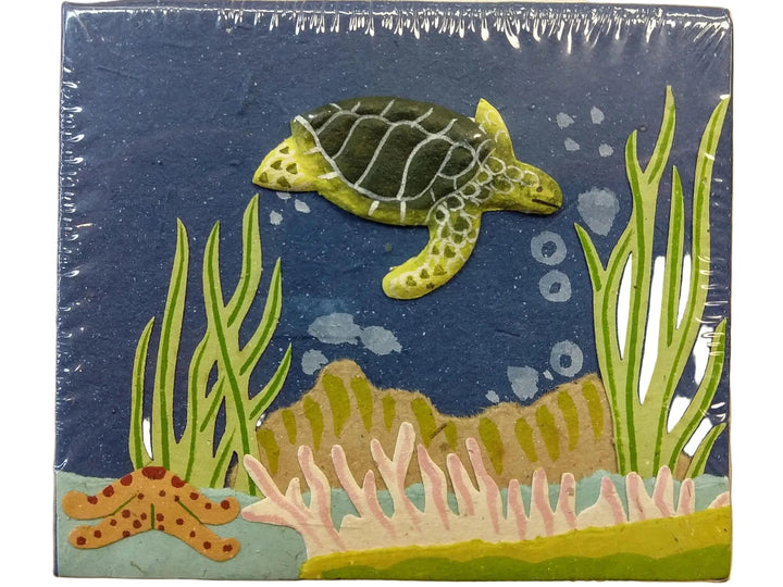 Several square note boxes with a sea turtle on a blue background