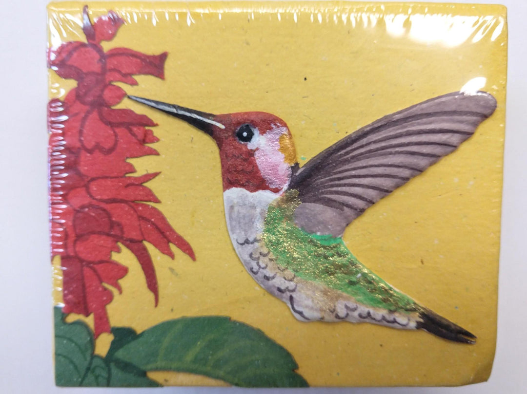 a note box with a hummingbird
