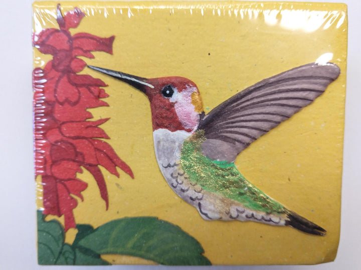 a note box with a hummingbird