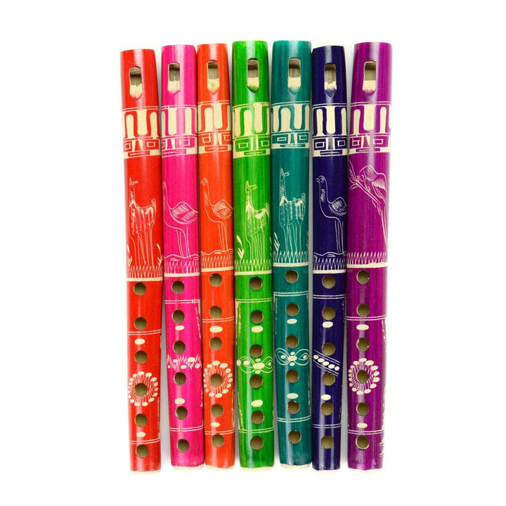 A selection of colorful bamboo flutes with decorative patterns, displayed vertically.