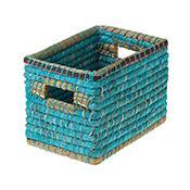 A blue green sari wrapped basket on a white background