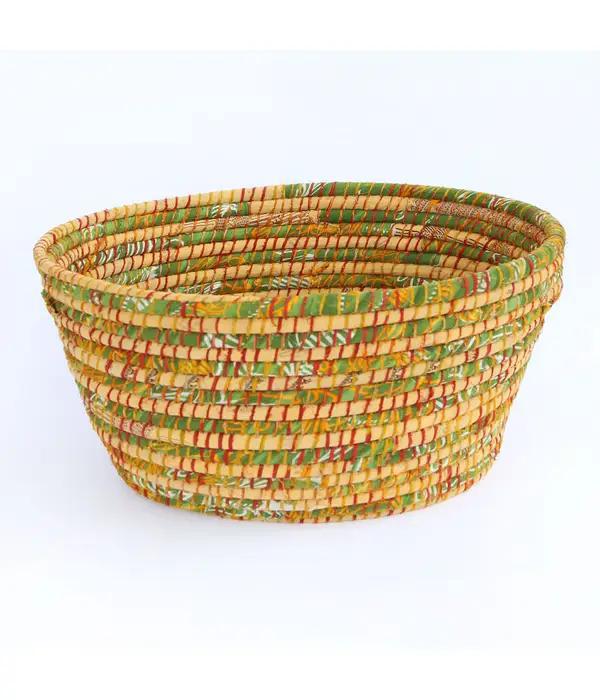 Bright Sari laundry basket on a white background