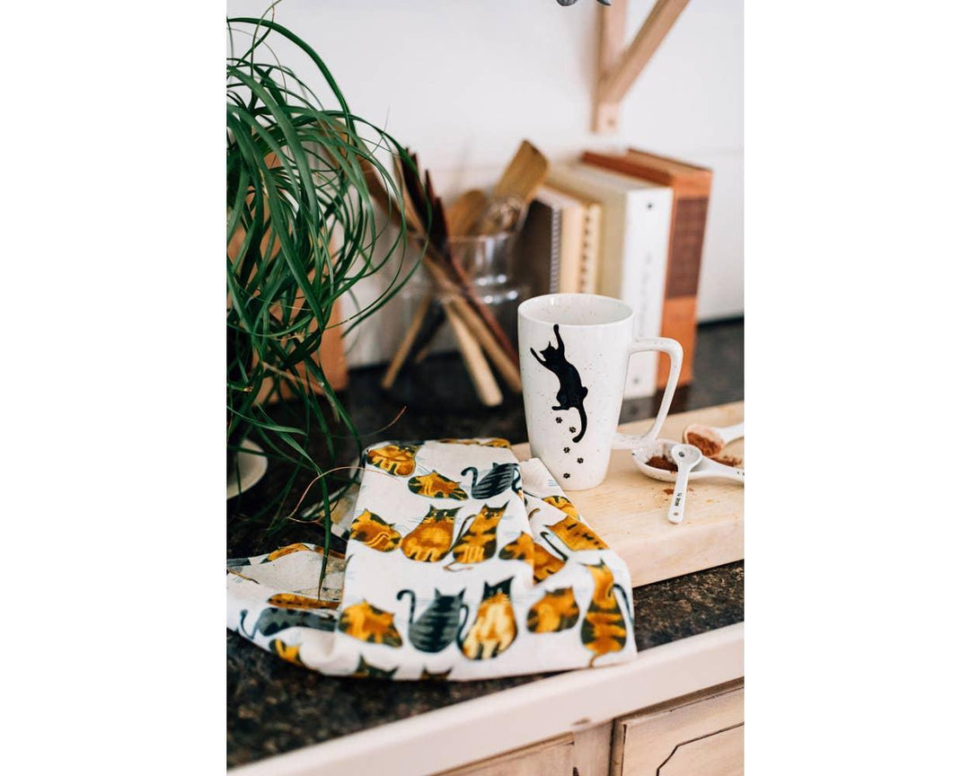 Cat print tea towel on a drink station
