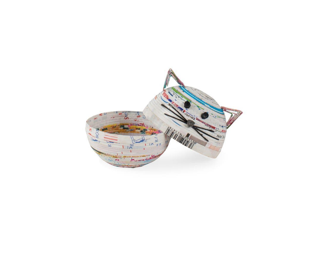 coiled paper box in the shape of a cat on a white background