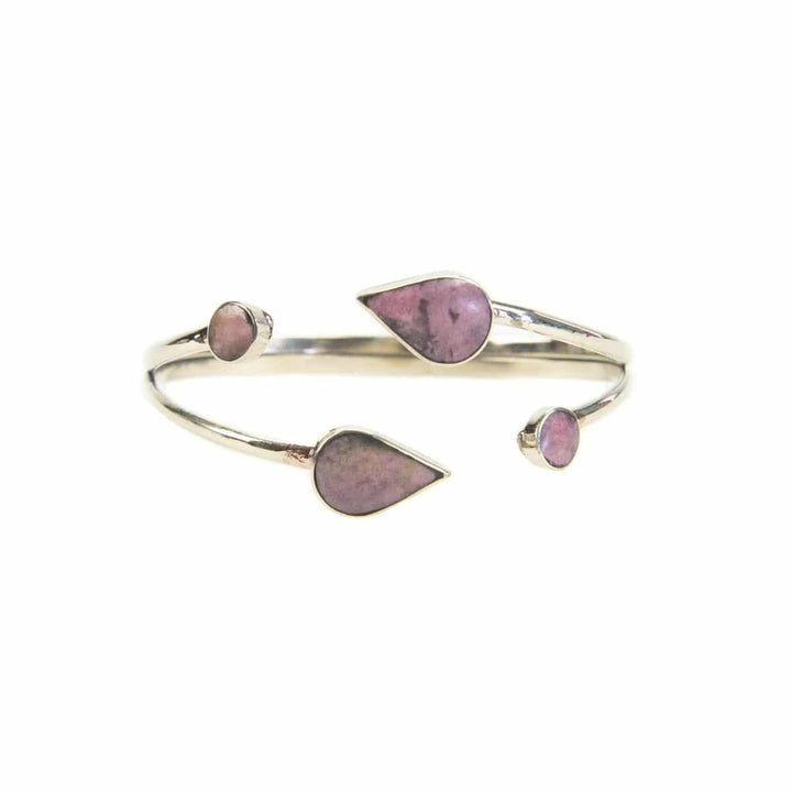 A silver bracelets with semi-precious stone leaves on a white background.
