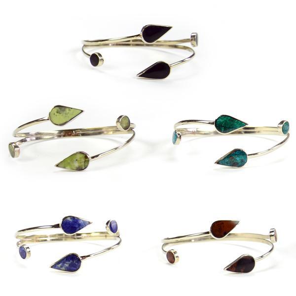 A collection of Espiga Bracelets with various semi-precious stones set in alpaca silver.