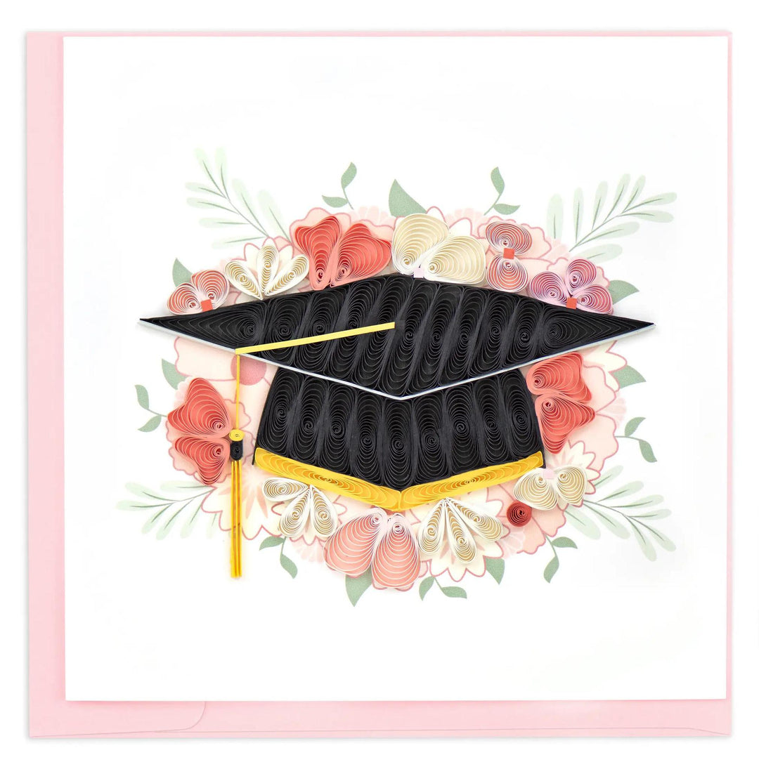 A floral graduation quilling card with a pink envelope 