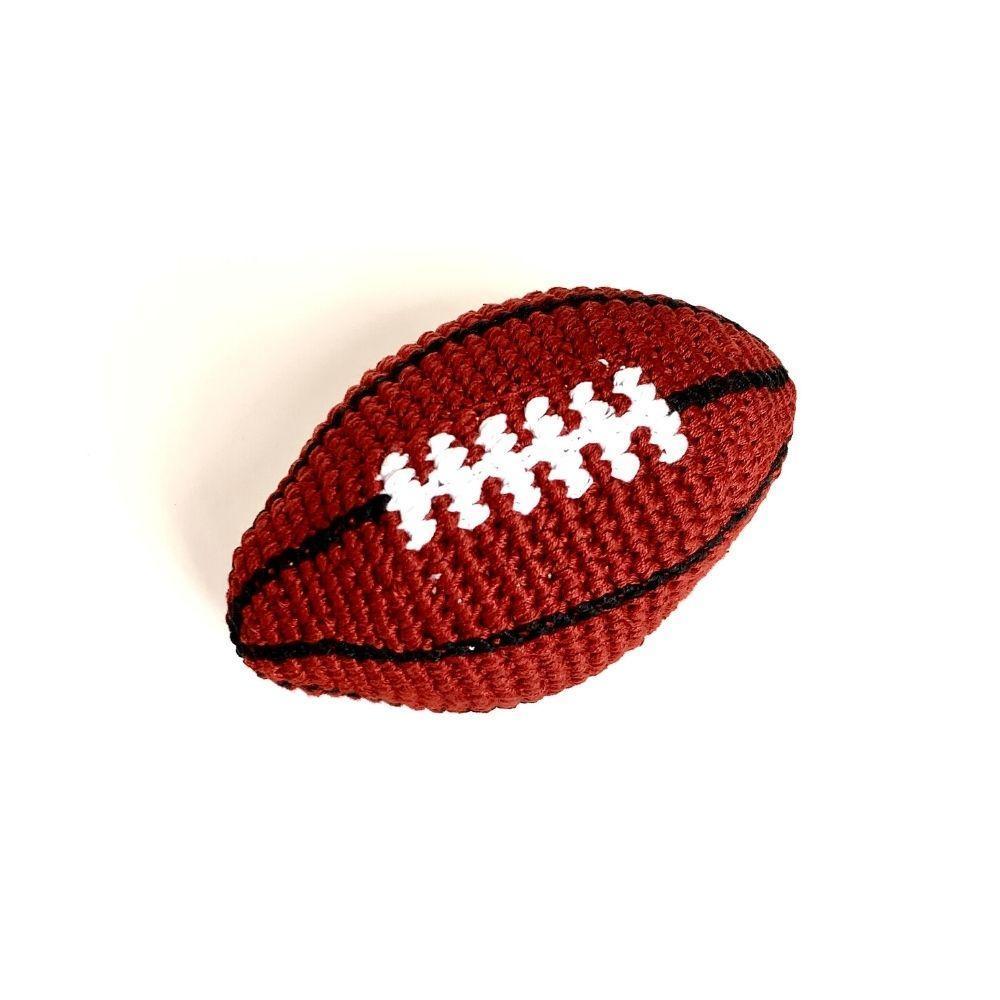 Brown football on a white background