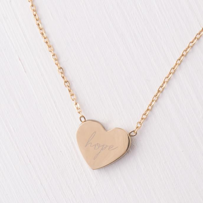 gold heart necklace with the word "hope"