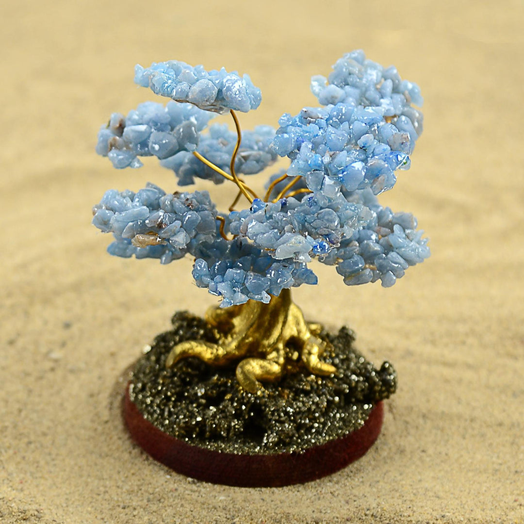 a celestite stone tree on a circular base