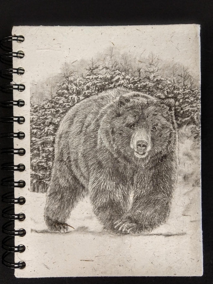 Mr. Ellie Pooh notebook with a sketched grizzly bear