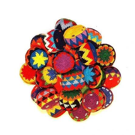 hacky sacks in a pile on a white background
