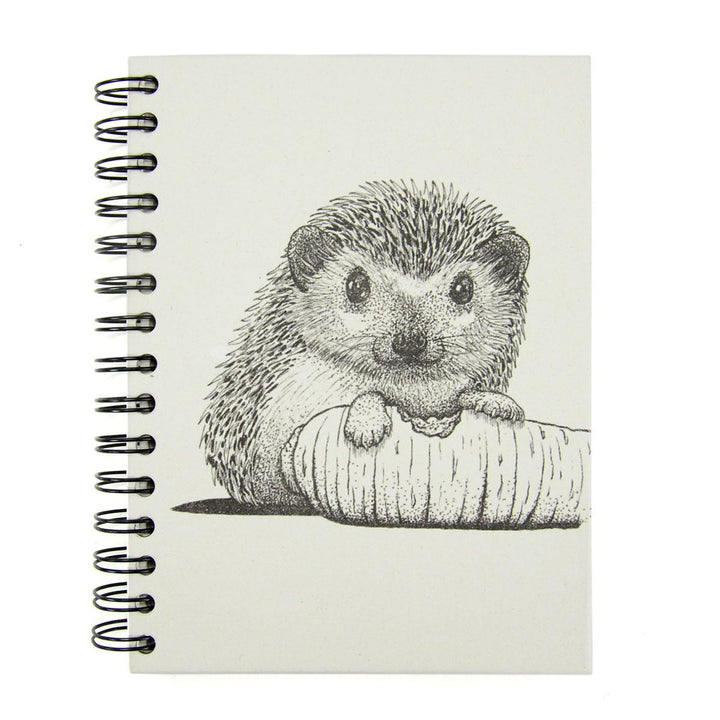 Mr. Ellie Pooh notebook with a sketched hedgehog
