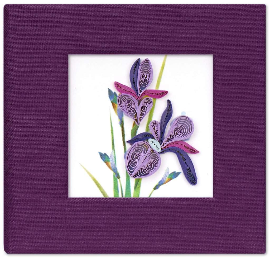 A handcrafted red sticky note cover with a quilled Iris design on the front, made of paper, displayed against a white background.