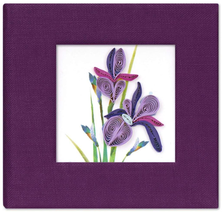 A handcrafted red sticky note cover with a quilled Iris design on the front, made of paper, displayed against a white background.