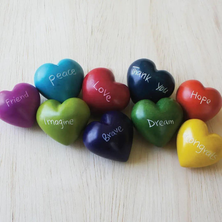 A collection of colorful kisii hearts on a white background