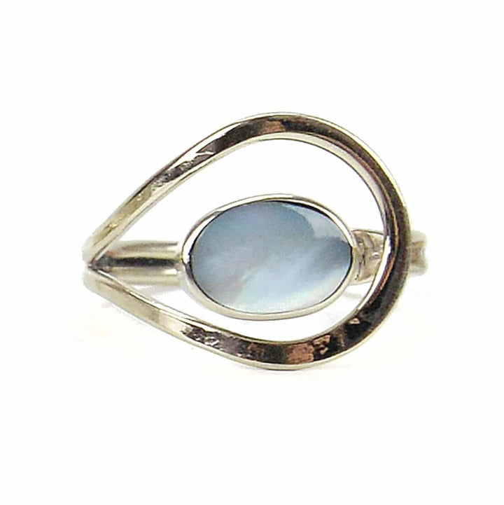 A ring with unique loop designs, featuring semi-precious stones, crafted from alpaca silver.