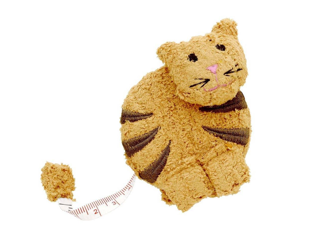 A beige measuring tape designed to look like a cat with a fabric body and plastic tape.