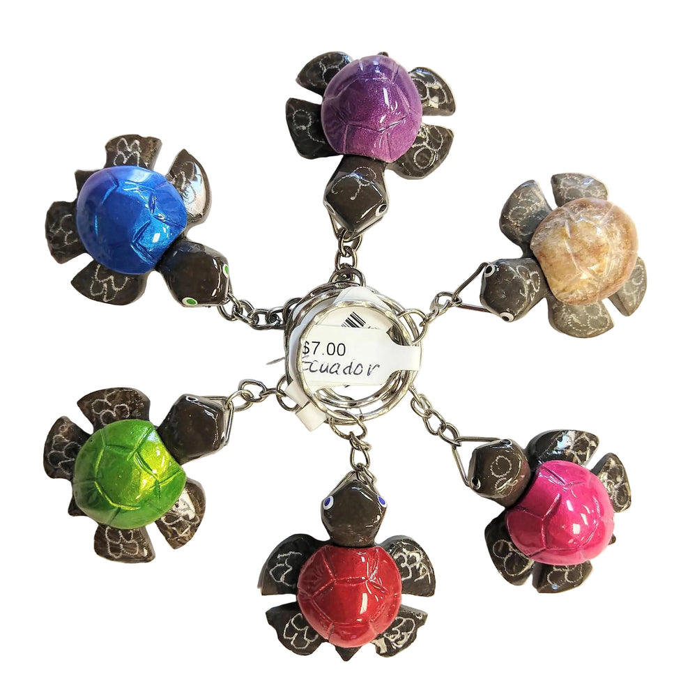 a collection of marble and onyx turtle keychains