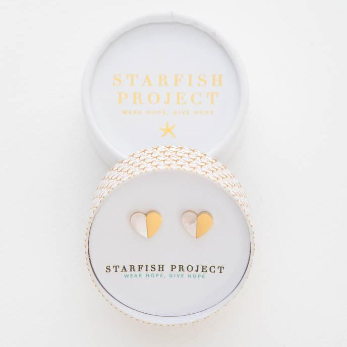 Gold and mother of pearl Give Hope Heart earrings.