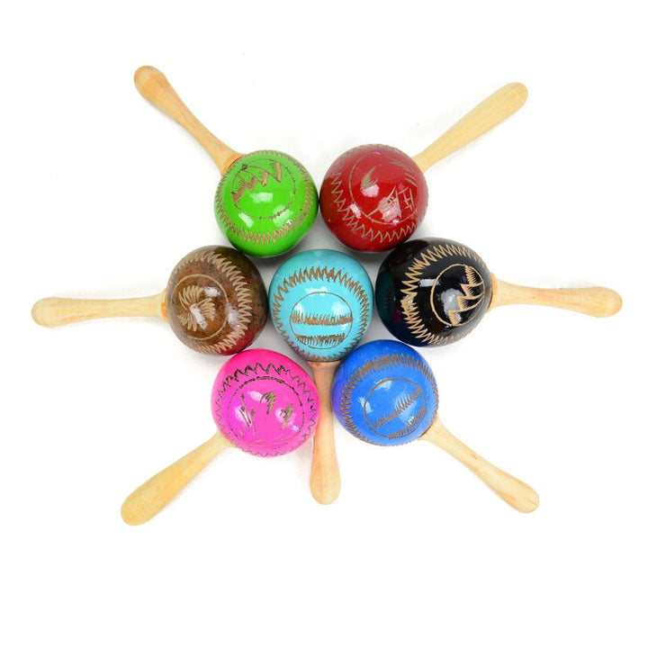 seven colorful maracas on a white background