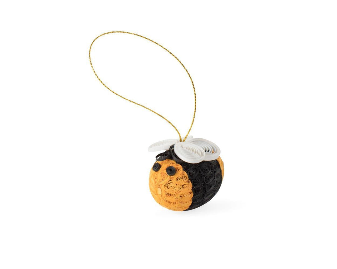 Quilled bubble bee ornament on a white background