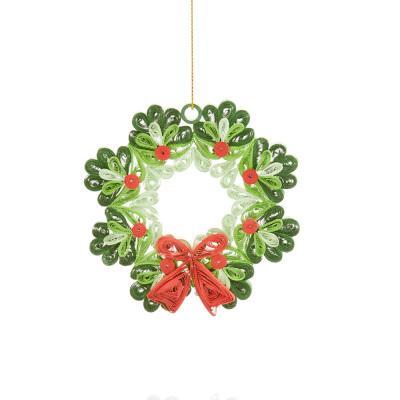 A quilled paper wreath ornament in green with red accents and a red bow, designed for hanging on a Christmas tree.